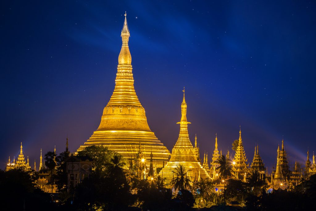 Shwedagon pagoda with blue night sky background in Yangon - LookOutPro