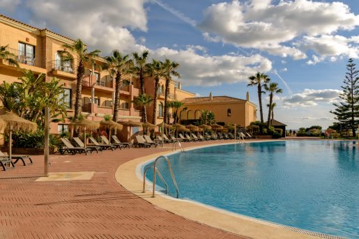 View of swimming pool area in Barcelo hotel and resort in Punta Umbria, Huelva, Spain.